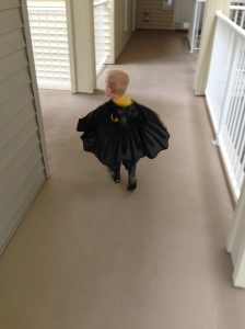 Off to Gymboree on a rainy day.  Seeing his cape fly always makes me smile.